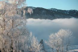 The winter morning transforms the mountain landscape