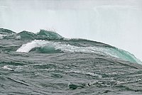 In small waves or in form of fog, the water returns