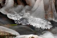 Interaction of flowing water and ice.